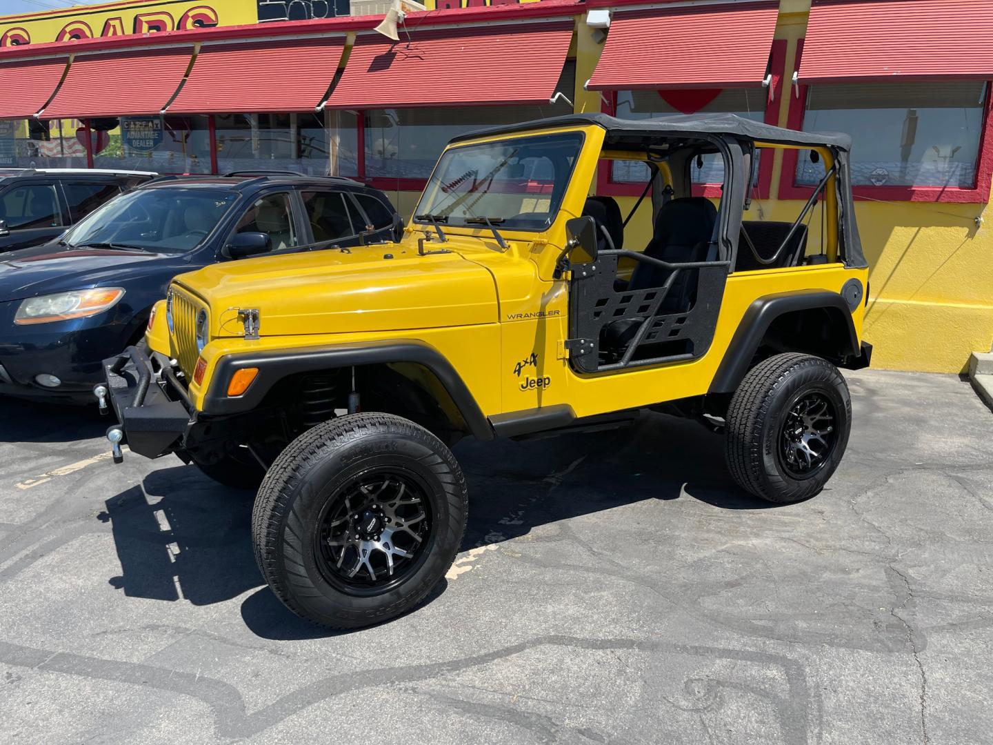 2000 Solar Yellow /Black Jeep Wrangler SE (1J4FA29P9YP) with an 2.5L 4 Cyl. engine, Manual transmission, located at 801 South State Street, Salt Lake City, UT, 84111, (801) 328-0098, 40.751953, -111.888206 - Wow extremely rare to find extra clean Jeep in immaculate condition 4x4! Low miles only 98,248 miles! Interior and exterior are both in excellent shape for the year. This is a clean title no reported accidents on the CarFax history report. It has passed emissions already and is ready to go. Featur - Photo#44